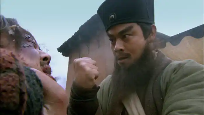 拳にて鎮関西を打つ