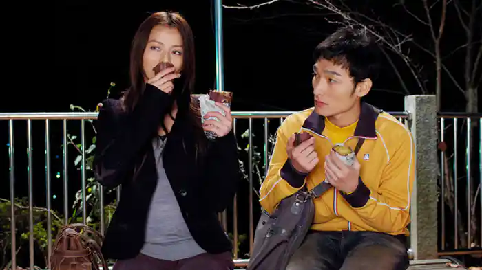 黄色い傘に降る涙