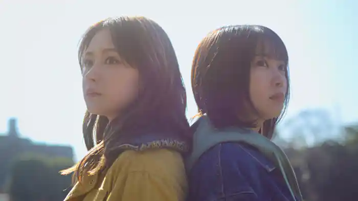 「背中を押す」