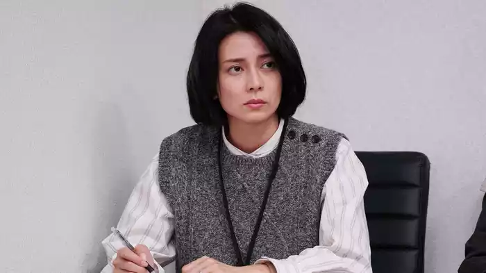 坂の途中の家