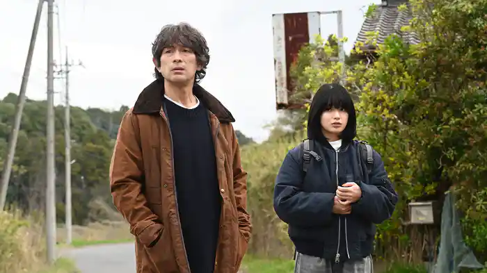 誰かがこの町で